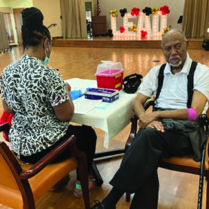 resident getting a health screening